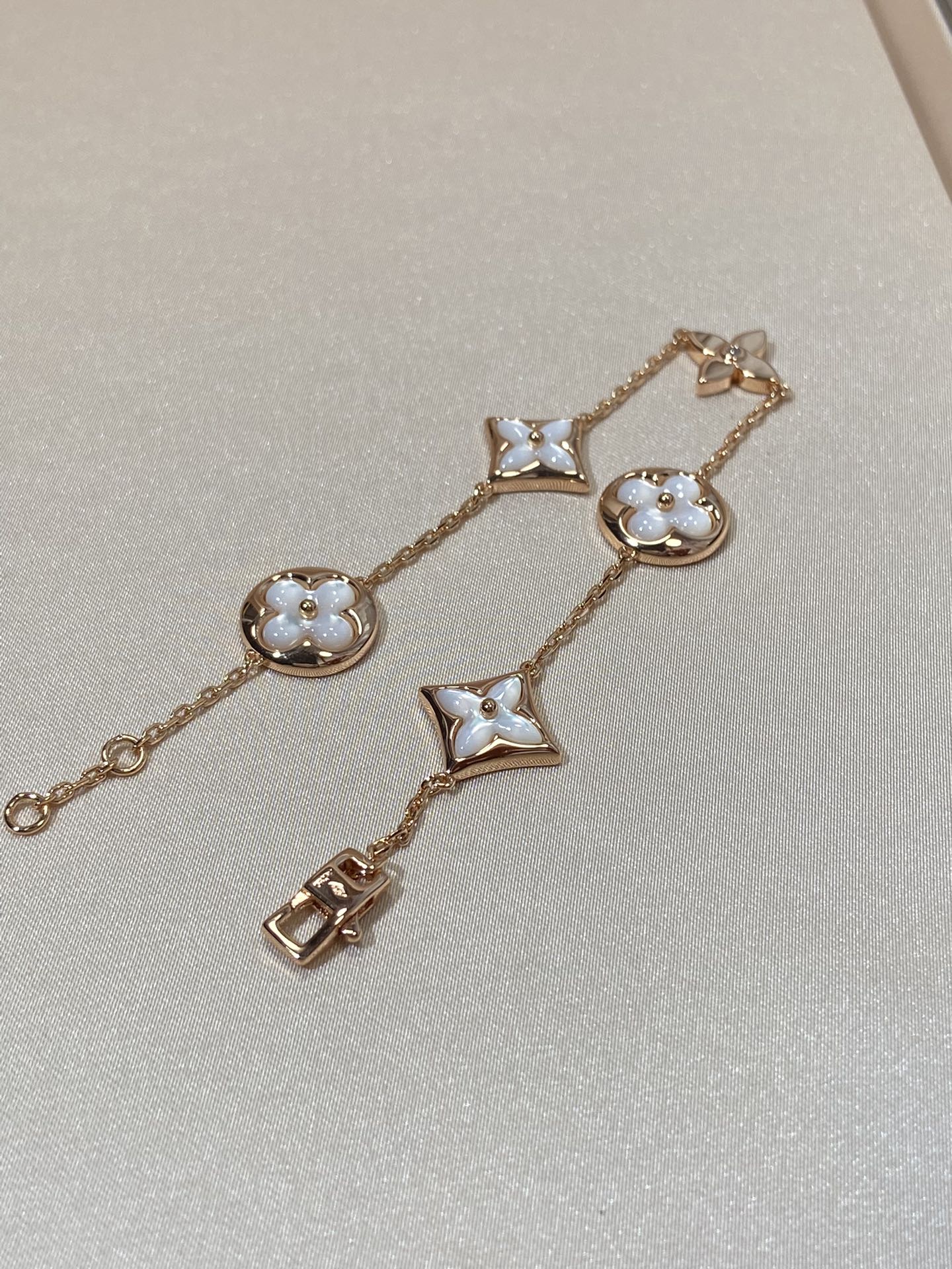 [Liorra]STAR AND SUN 5 MOTIF MOP PINK GOLD BRACELET