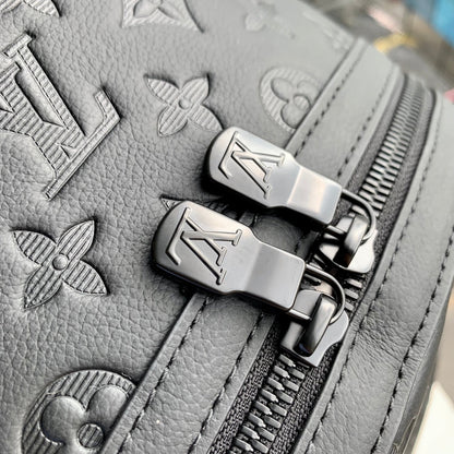 DISCOVERY PM BACKPACK 38 IN BLACK MONOGRAM LAMBSKIN
