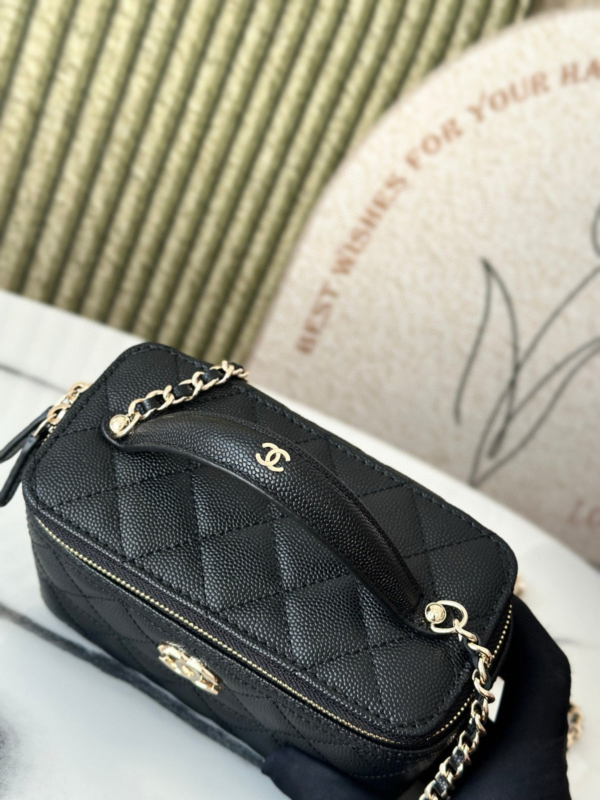 VANITY 17 CAVIAR WITH HANDLE IN BLACK CALFSKIN GOLD HARDWARE
