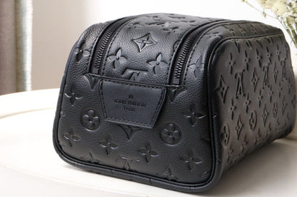 DOPP KIT TOILETRY BAG 28 CM IN BLACK TAURILLON MONOGRAM LEATHER