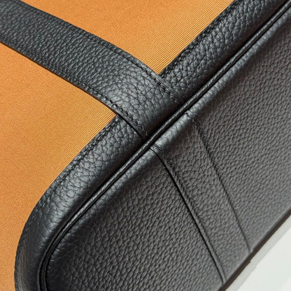 GARDEN PARTY 30CM IN ORANGE MINIMUM TOILETS COTTON CANVAS AND BLACK CALFSKIN