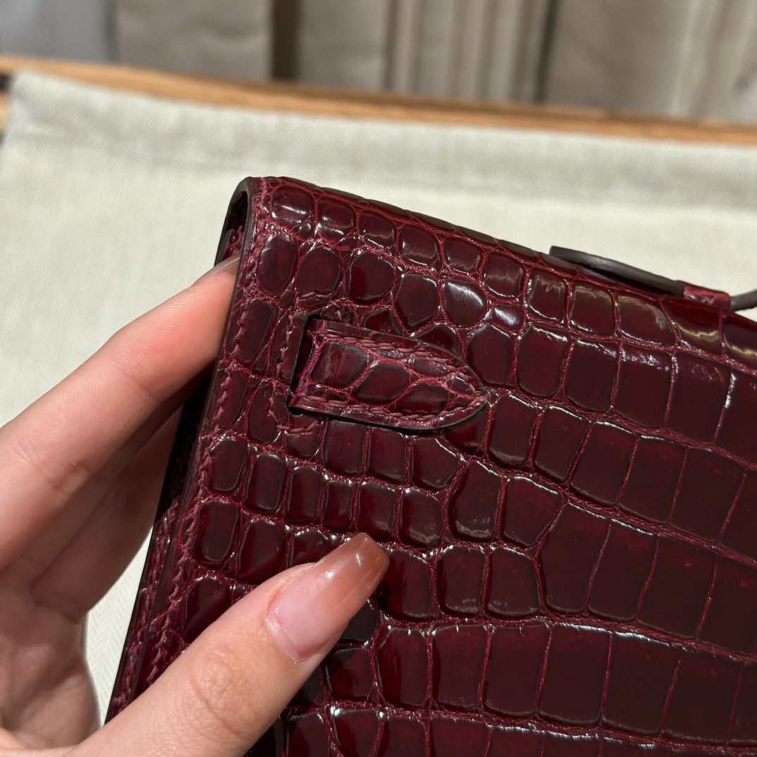 KELLY CUT 31 IN SANGRIA PURPLE ALLIGATOR LEATHER WITH GOLD HARDWARE (MADE-TO-ODER)