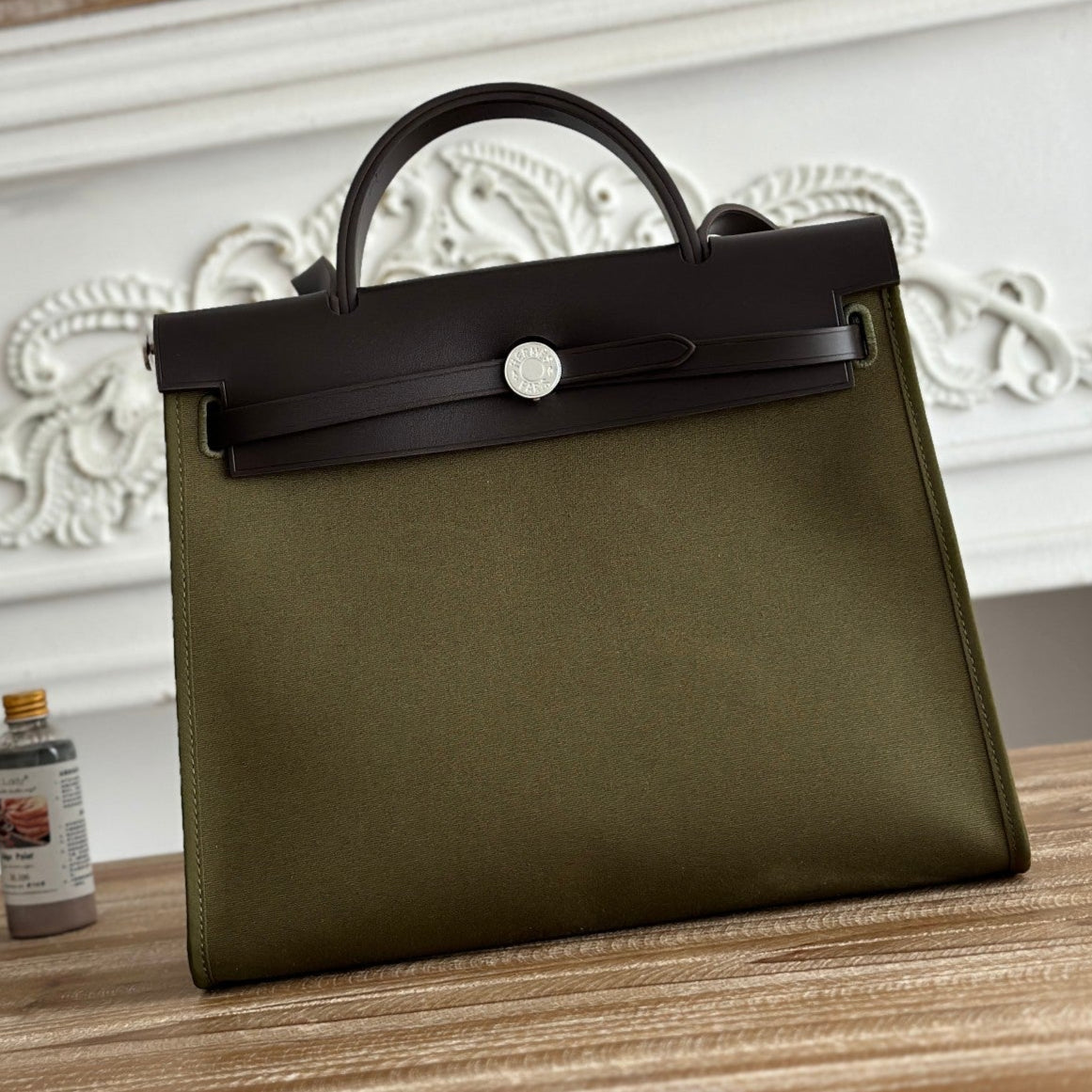 ZIP CABINE 31 BAG IN OLIVE GREEN CANVAS AND BLACK CALFSKIN